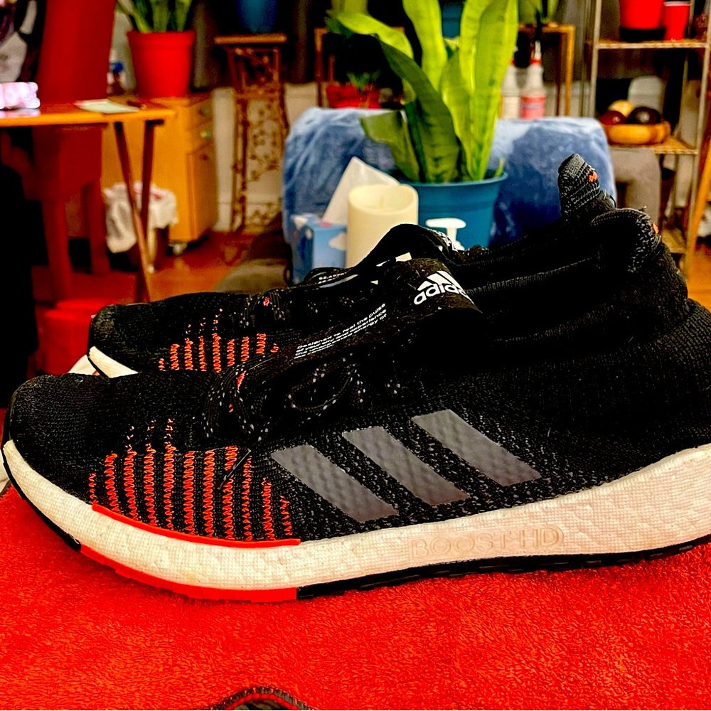 One pair of adidas Pulse Boost running shoes.